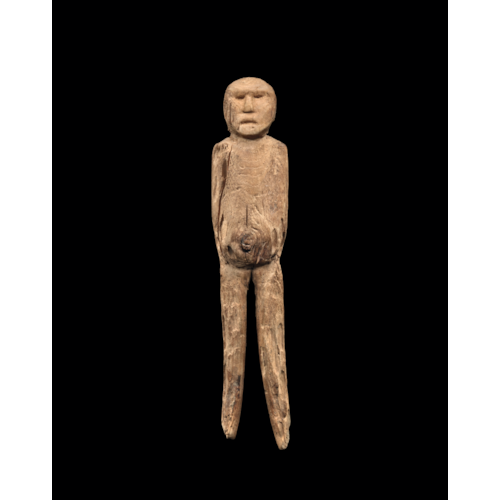 A minute figure of a pregnant woman.